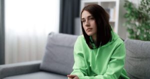 Woman thinking about what to do after finding out she's pregnant
