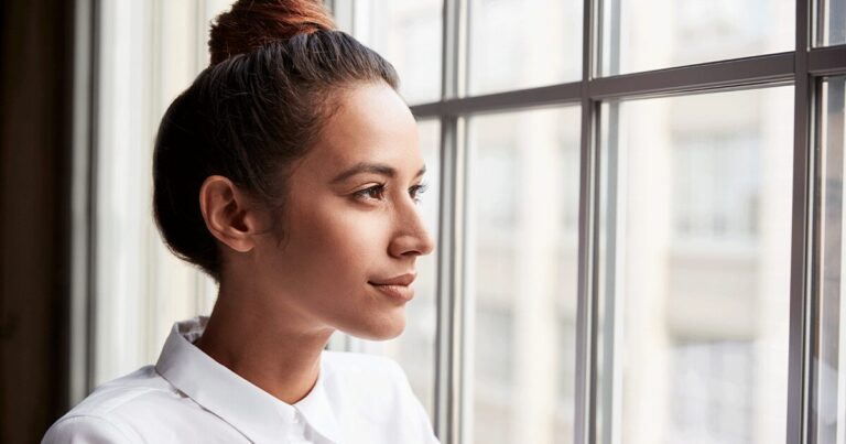 Thoughtful woman wondering about becoming pregnant again after an abortion.